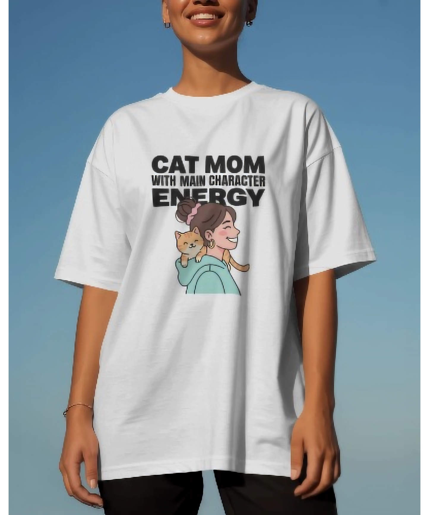 White premium women's t-shirt by Nite Stream featuring a cute aesthetic graphic of a girl holding an orange cat with bold typography reading 'Cat Mom With Main Character Energy'.