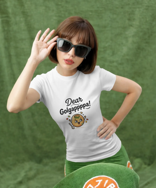 A smiling woman modeling a white graphic t-shirt. The t-shirt features the text "Dear Golgappppa!" above an adorable, kawaii-style illustration of a golgappa (panipuri) holding a small spoon. Premium, quirky food-lover streetwear by The Nite Stream.